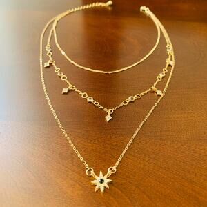 Layered Gold Necklace with Star Pendant and Crystal Accents